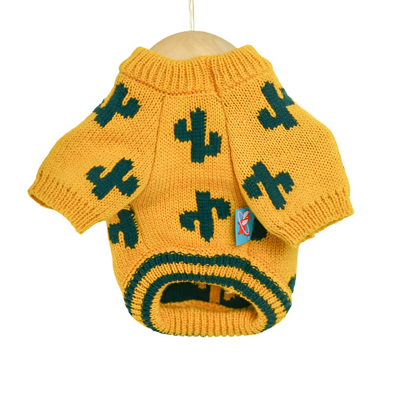 Dog clothing knitted jumper. Yellow wool with green cactus pattens and a green double stripe on the waisteband. Cozy sweater.