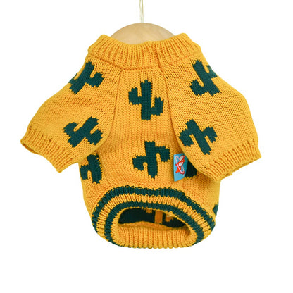 Dog clothing knitted jumper. Yellow wool with green cactus pattens and a green double stripe on the waisteband. Cozy sweater.