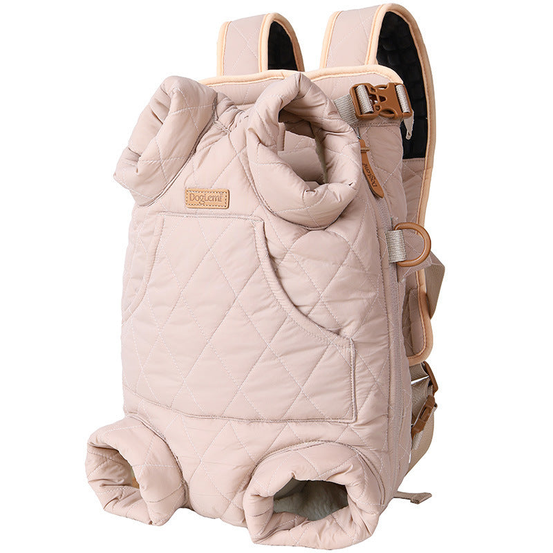 Pink, quilted dog carrier bag with tan hardware. Backpack or chest pack style, safe dog carrying for small to medium dogs. 